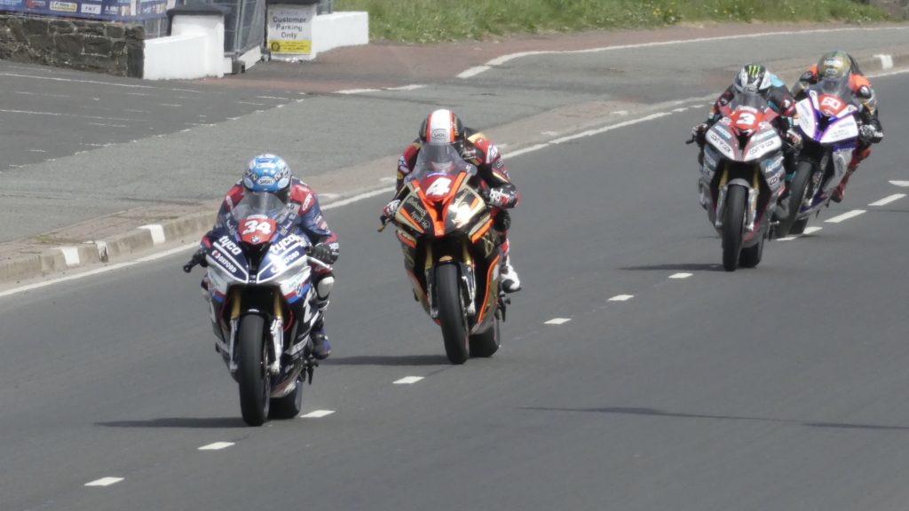 Alastair Seeley, Michael Rutter, Michael Dunlop and Peter Hickman in a tight fight during the superstock race - at the 2018 NW2018 (19/05/2018)
