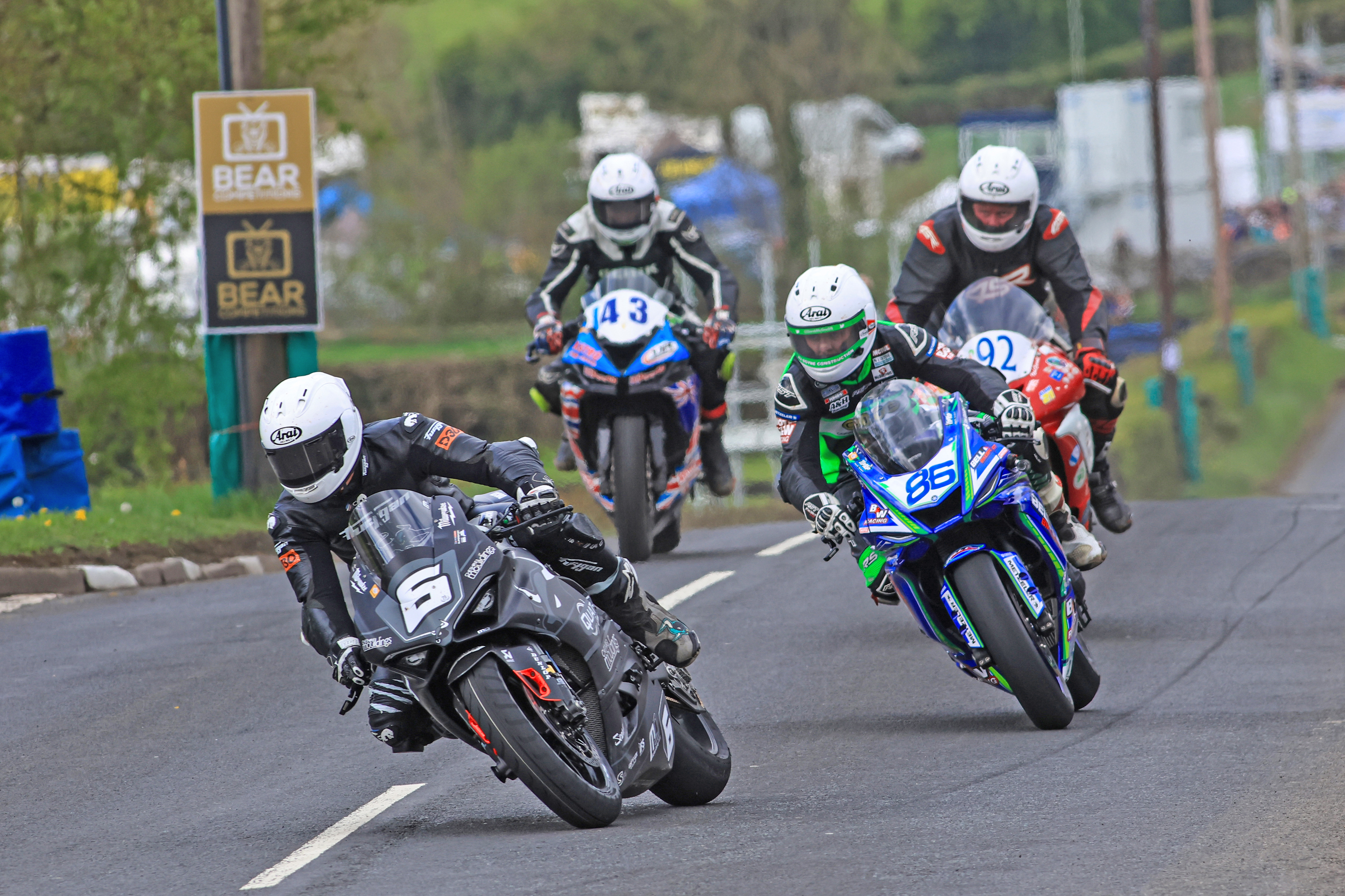 Action from 2025 Bear Competitions Cookstown 100 road races, with Michael Dunlop MBE leading Derek McGee. Cookstown 100 Races Secure Major Boost with BEAR Competitions Sponsorship Renewal.