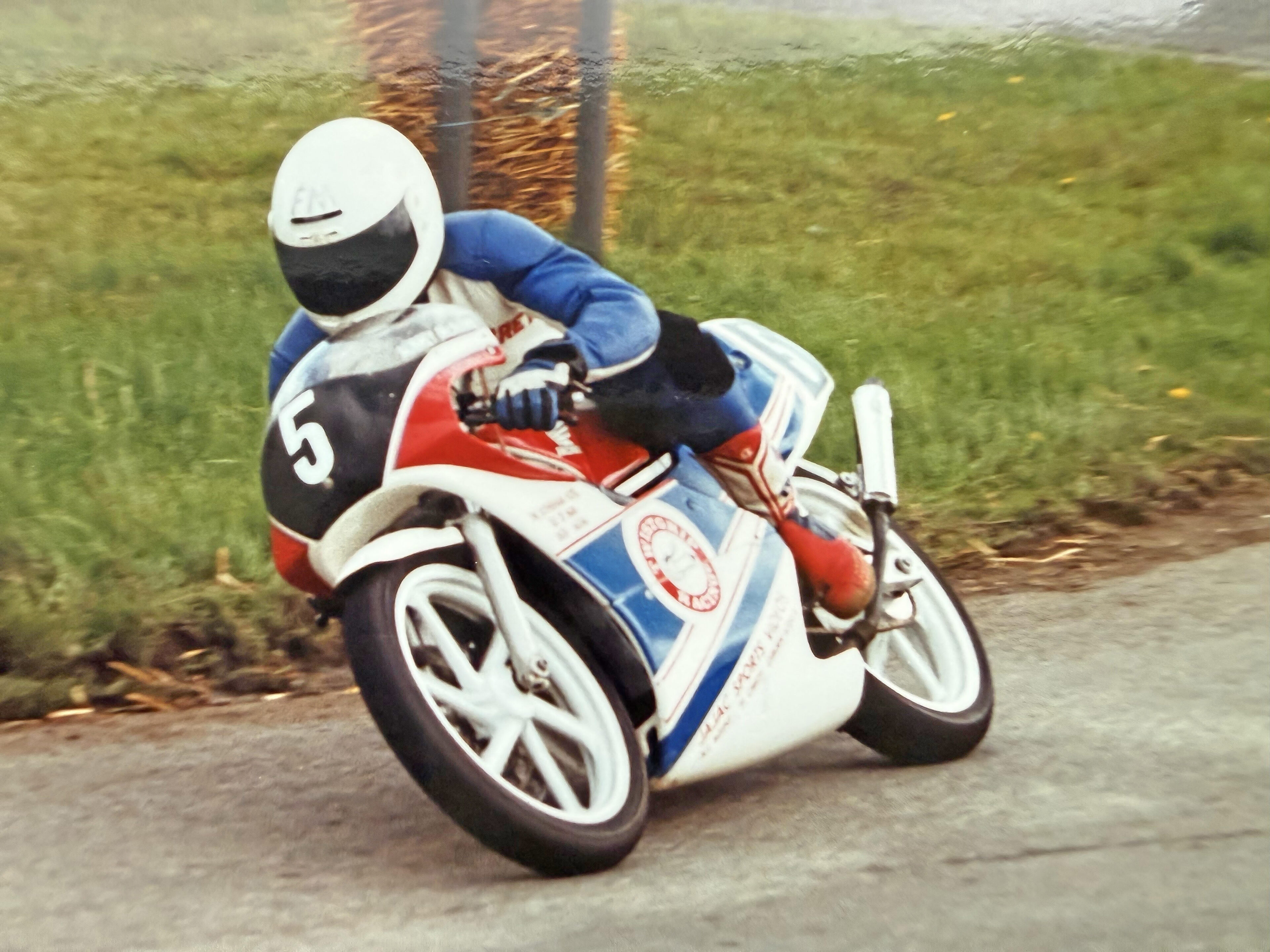 The late Aubrey McAuley in action on the Twistgrip Supporters Club 125 Honda.